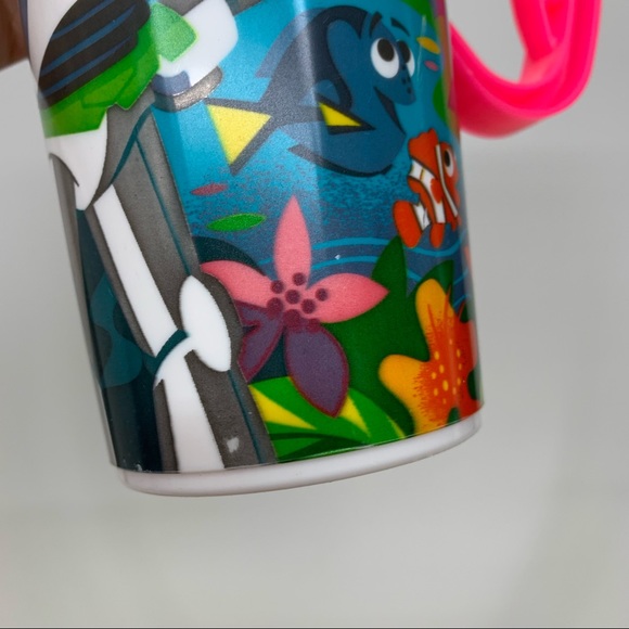 Disney World Set Of Two Neon Whirley Travel Mugs With Handles Buzz Cars Nemo - Picture 7 of 16